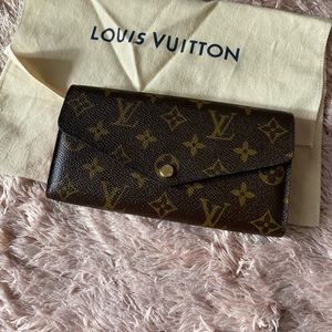 Louis Vuitton Sarah wallet monogram red interior.